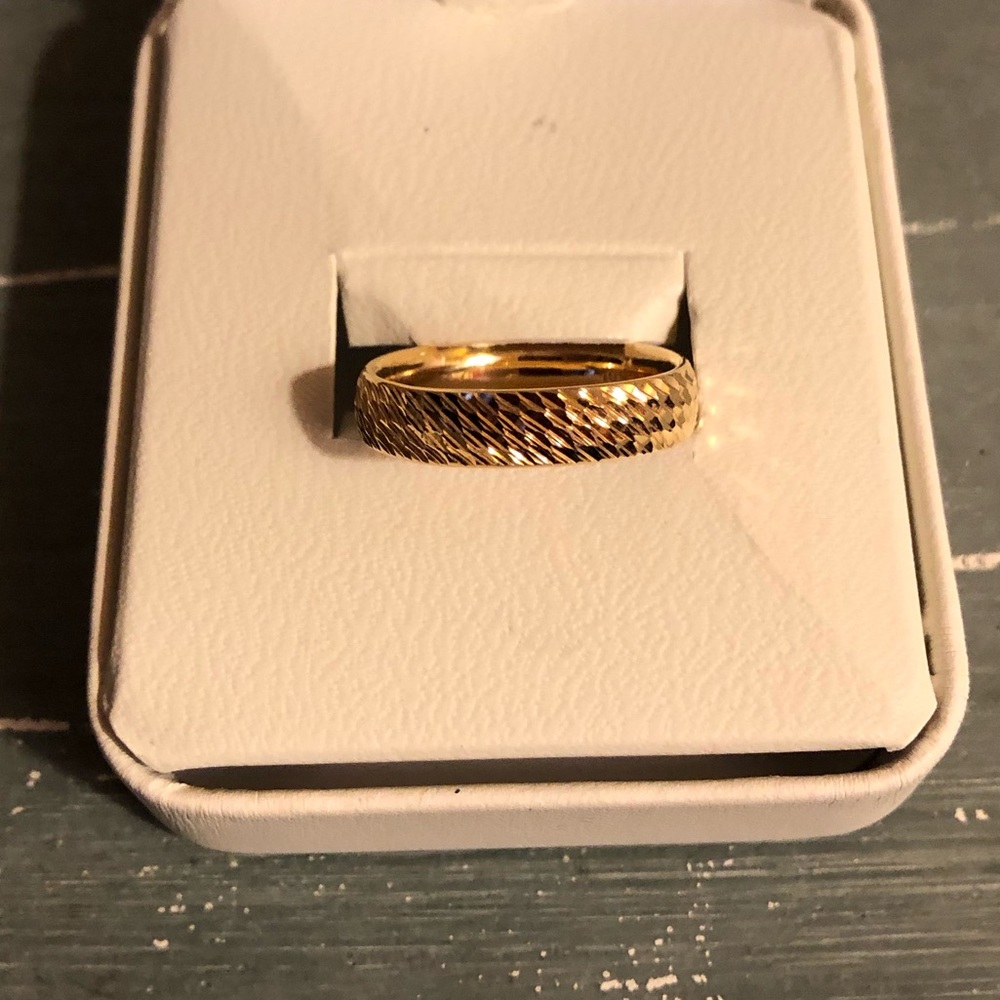 Women’s gold ring.